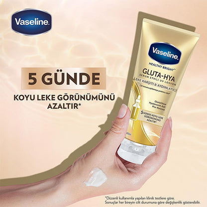 Vaseline Gluta-Hya serum tube in gold packaging with blue Vaseline logo, held in hand on Tampa Home & Garden Store
