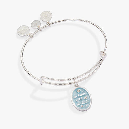 Silver Alex and Ani bridal bangle with blue enamel disc inscribed To Have And To Hold on Tampa Home & Garden Store