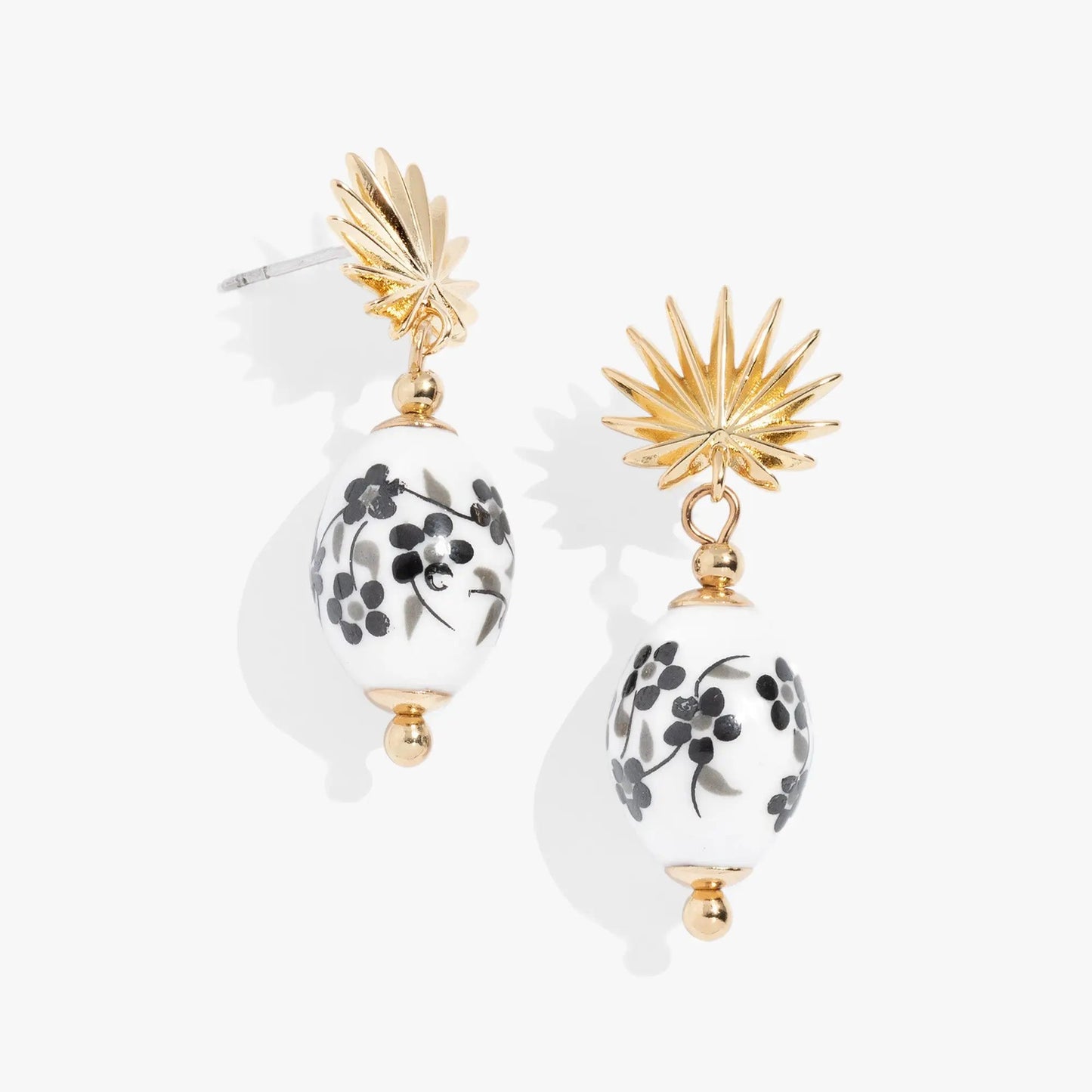 Toile and Palm Drop Earrings by ALEX AND ANI; goldtone starburst tops with ceramic floral drops on Tampa Home & Garden Store
