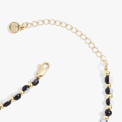 Toile Beaded Palm Pendant Necklace by ALEX AND ANI, gold-tone chain with black gray white beads and palm charm on Tampa Home & Garden Store