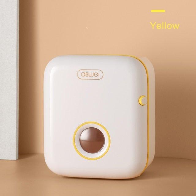 Toilet paper holder tissue dispenser aswel on white body with yellow trim, round window on Tampa Home & Garden Store