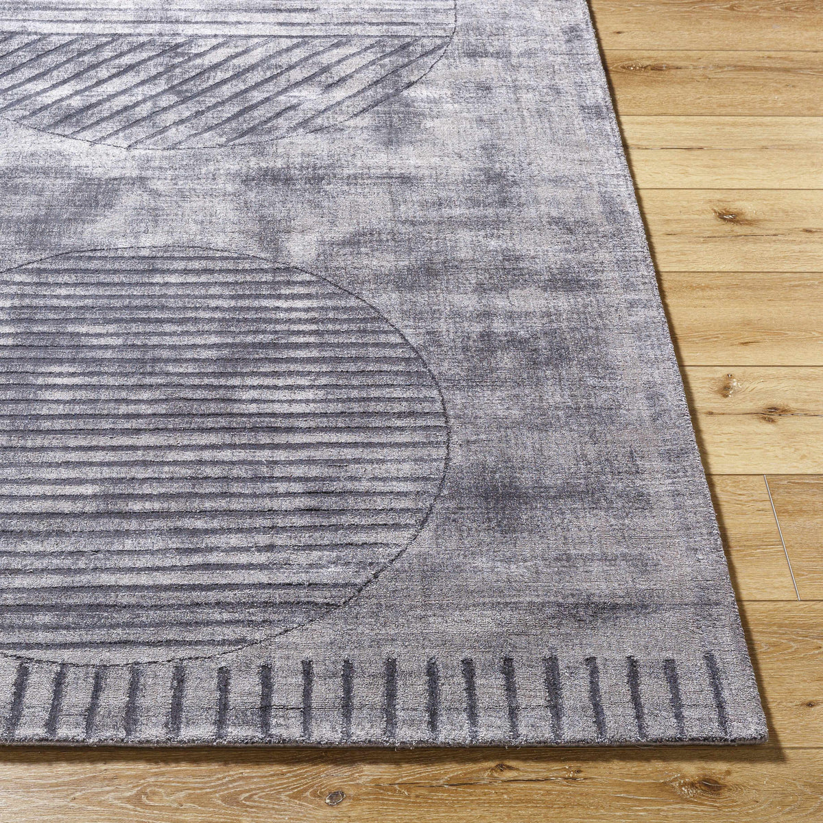 Timna Area Rug by Boutique Rugs, gray blue distressed pile with subtle linear pattern on Tampa Home & Garden Store