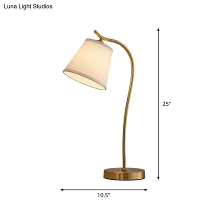 Brass bucket table lamp with white shade and curved neck, 25in tall on Tampa Home & Garden Store