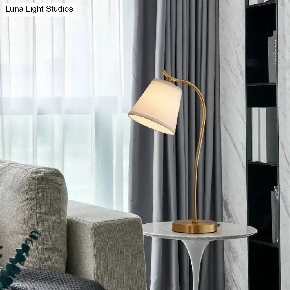Traditional brass bucket lamp by Decorbites with white shade on marble side table on Tampa Home & Garden Store