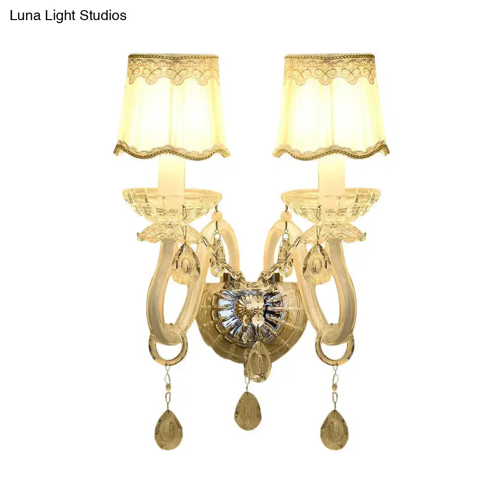 Traditional White Candle Wall Lamp with Clear Crystal Accent and Scalloped Fabric Shade