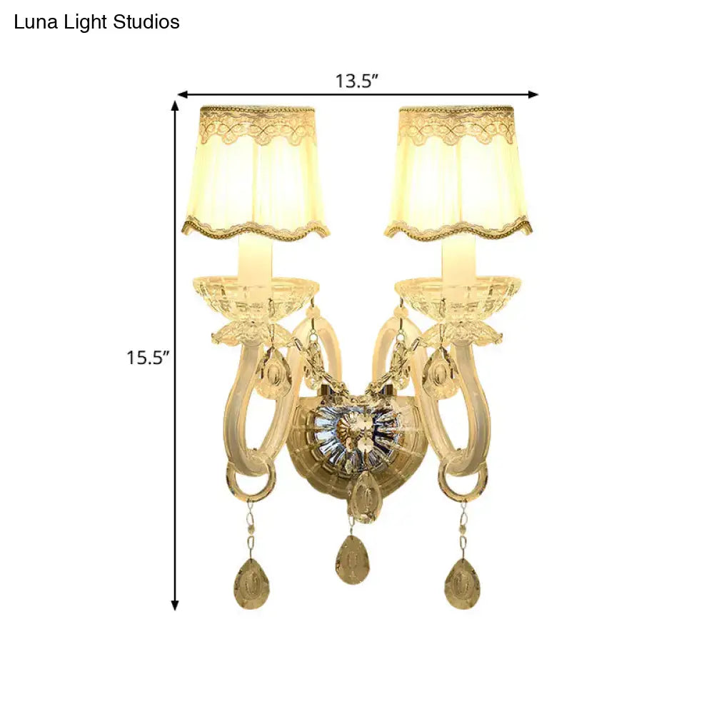 Traditional White Candle Wall Lamp with Clear Crystal Accent and Scalloped Fabric Shade