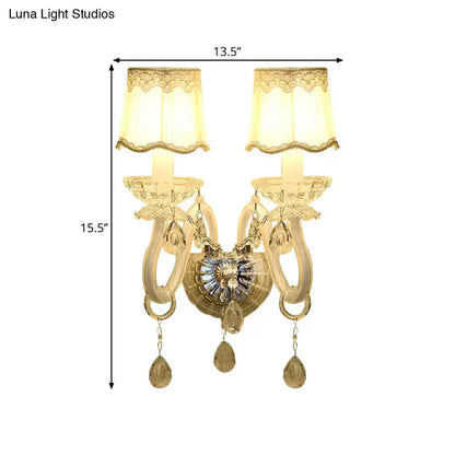 Traditional White Candle Wall Lamp with Clear Crystal Accent and Scalloped Fabric Shade