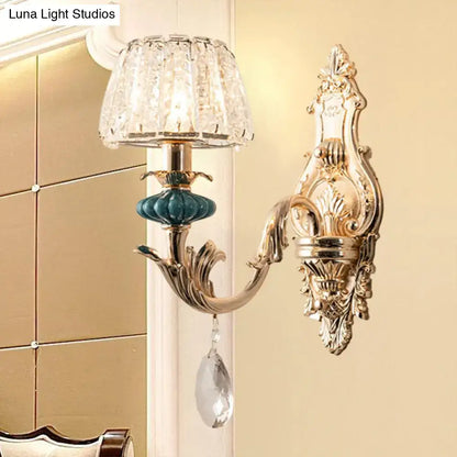 Gold Teal Crystal Wall Sconce with ornate gold backplate and hanging crystal drop on Tampa Home & Garden Store