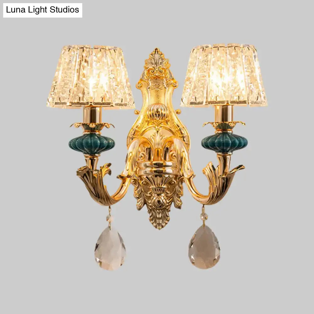 Gold Teal Crystal Wall Sconce with ornate gold backplate, dual crystal shades and teardrop prisms on Tampa Home & Garden Store