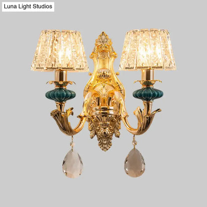Gold Teal Crystal Wall Sconce with ornate gold backplate, dual crystal shades and teardrop prisms on Tampa Home & Garden Store