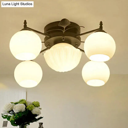 White glass bubble ceiling light with 4 glass globes around a central ribbed shade Decorbites on Tampa Home & Garden Store