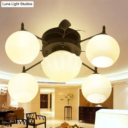 White Glass Bubble Ceiling Light flush mount with four frosted globes around a central shade on Tampa Home & Garden Store