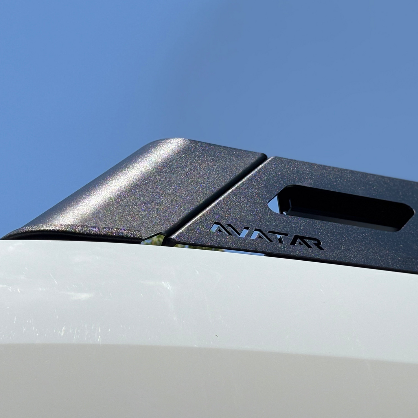Avatar Pioneer Transit Roof Rack glossy black finish with visible Avatar Offroad branding on Tampa Home & Garden Store