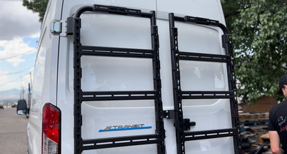 Avatar Massif van rear-door storage mounting system with dual black rails on white Ford Transit on Tampa Home & Garden Store