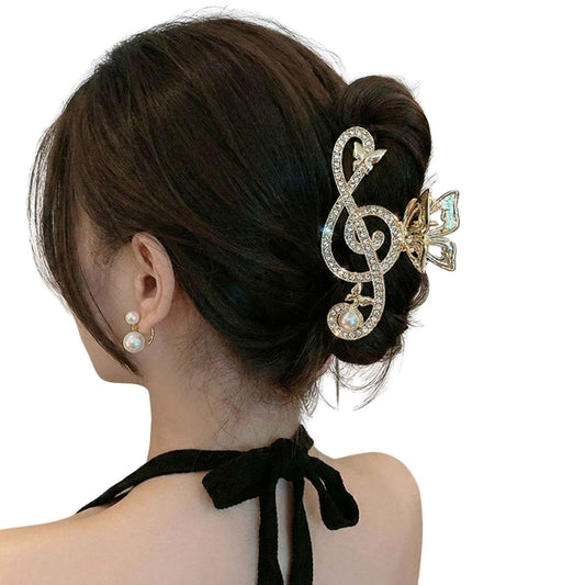 Sparkling Gold Tone Treble Clef Rhinestone Clip