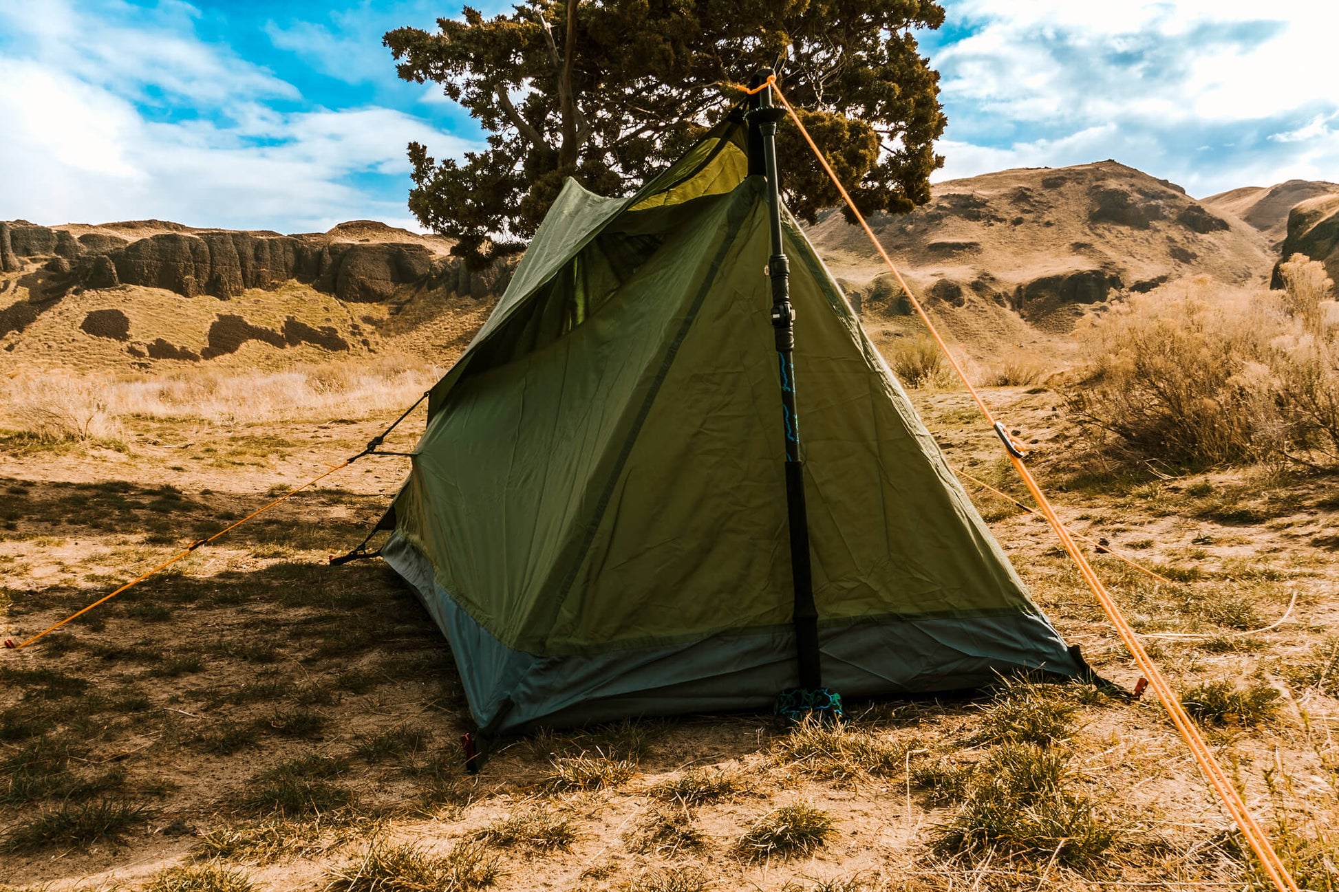 Trekker Tent 1V, olive green 1-person River Country Gear backpacking tent with orange guylines on Tampa Home & Garden Store