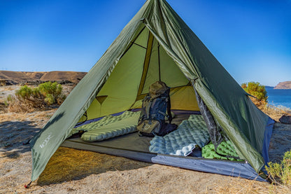 Trekker Tent 4-person by River Country Gear, green pyramid tent with sleeping pads inside on Tampa Home & Garden Store