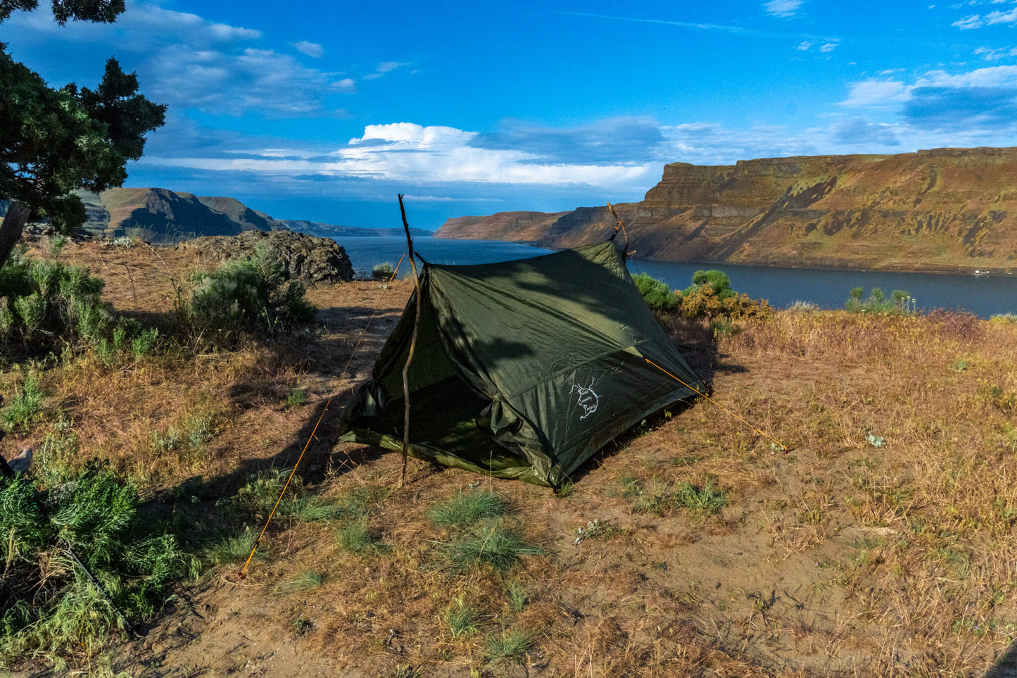 Trekker Tent 2 2-Person Backpacking Tent by River Country Gear, green tent pitched by lake on Tampa Home & Garden Store