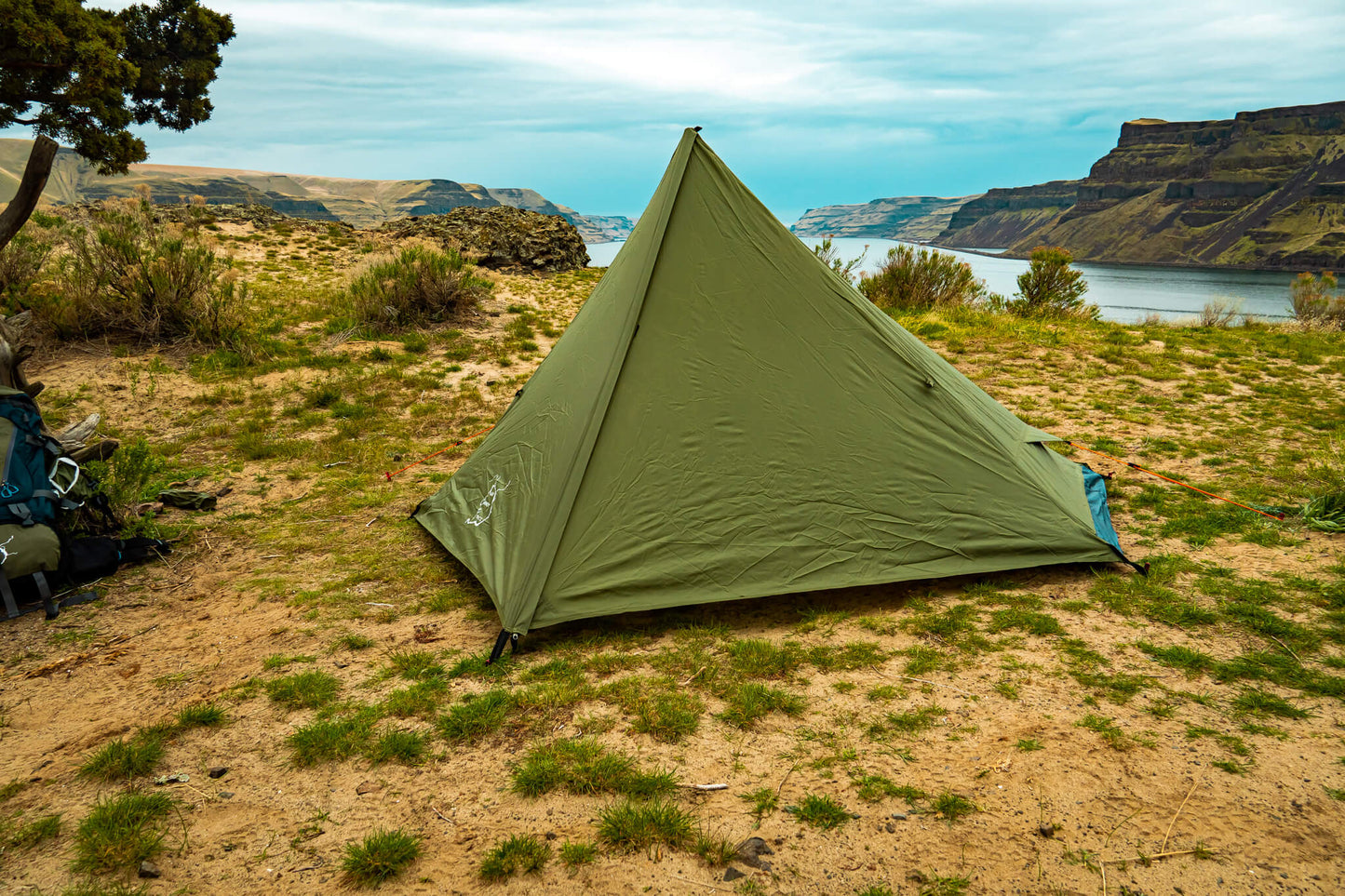 River Country Gear Trekker Tent 1 1-Person Backpacking Tent olive green pitched near lakeside on Tampa Home & Garden Store
