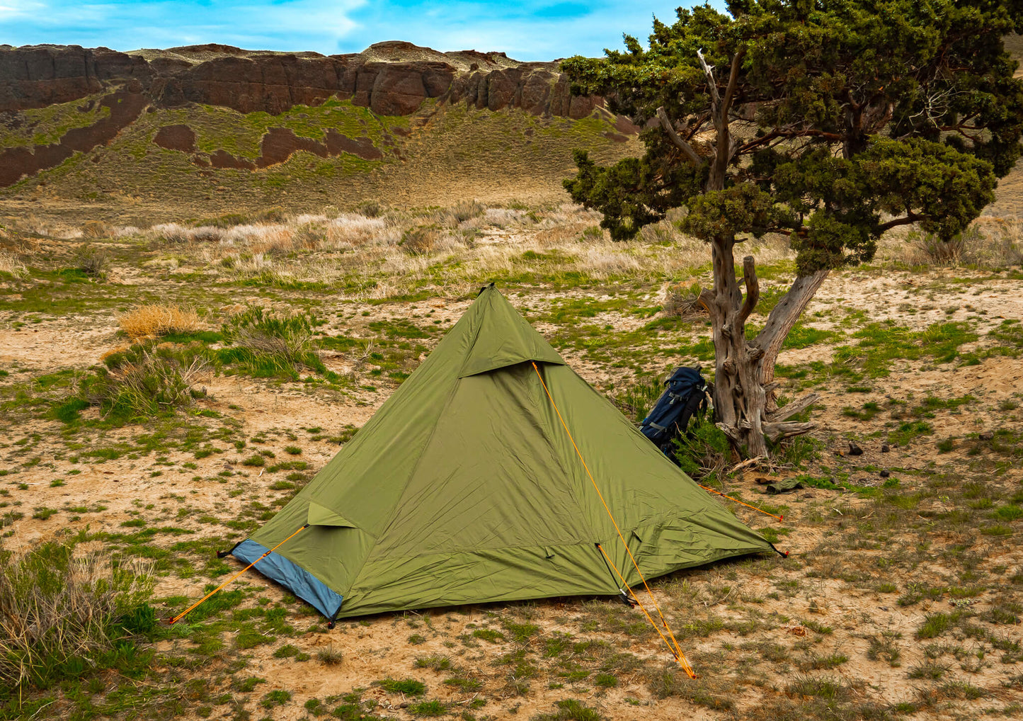 Trekker Tent 1 River Country Gear olive green 1-person backpacking tent at desert campsite on Tampa Home & Garden Store