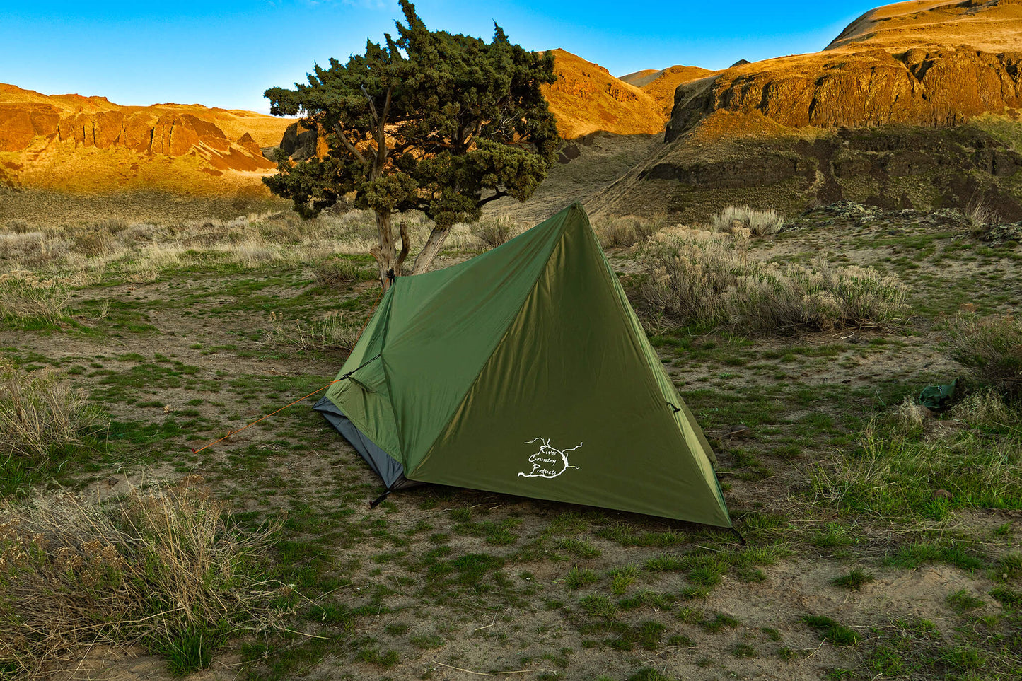 Trekker Tent 2V 2-person River Country Gear green backpacking tent in a desert canyon on Tampa Home & Garden Store