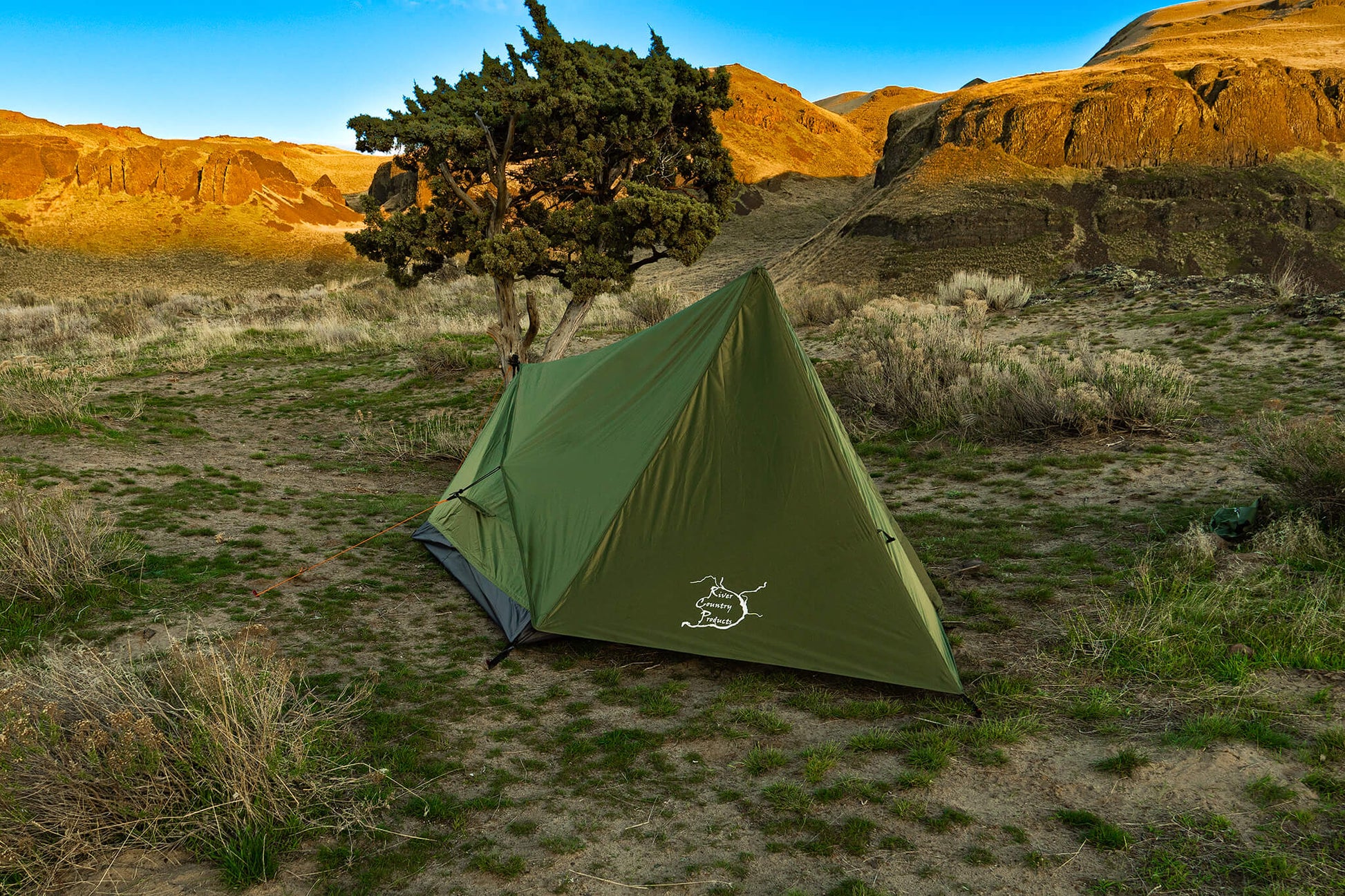 Trekker Tent 2V 2-person River Country Gear green backpacking tent in a desert canyon on Tampa Home & Garden Store