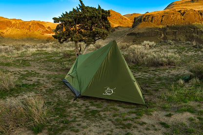 Trekker Tent 2V 2-person River Country Gear green backpacking tent in a desert canyon on Tampa Home & Garden Store