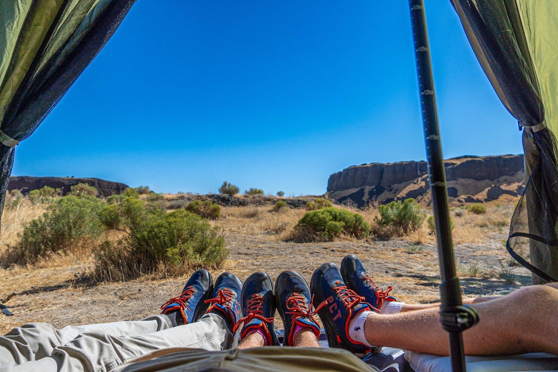 Trekker Tent 4 by River Country Gear, 4-person pyramid tent, interior view with boots on Tampa Home & Garden Store