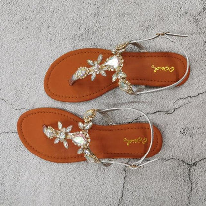 Pair of Stevvex crystal rhinestone sandals with silver back strap, open toe, tan footbeds on Tampa Home & Garden Store