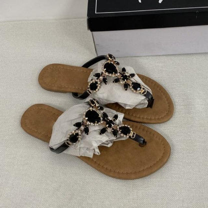 Stevvex pair of flat sandals with rhinestone embellishments, tan footbed, back strap on Tampa Home & Garden Store