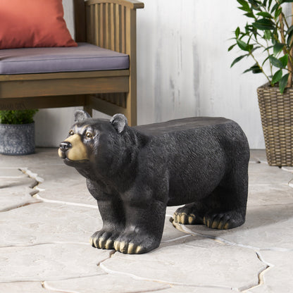MGO Bear Bench outdoor statue, dark charcoal bear with beige muzzle beside a wooden bench on Tampa Home & Garden Store