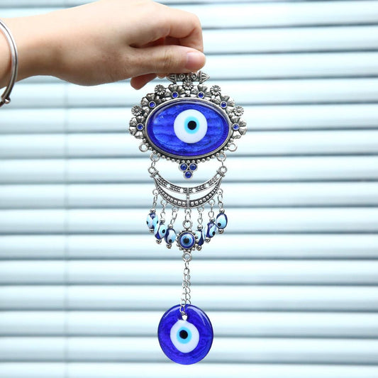 Turkish blue evil eye wall hanging wind chime by Stevvex with silver metal frame and beads on Tampa Home & Garden Store