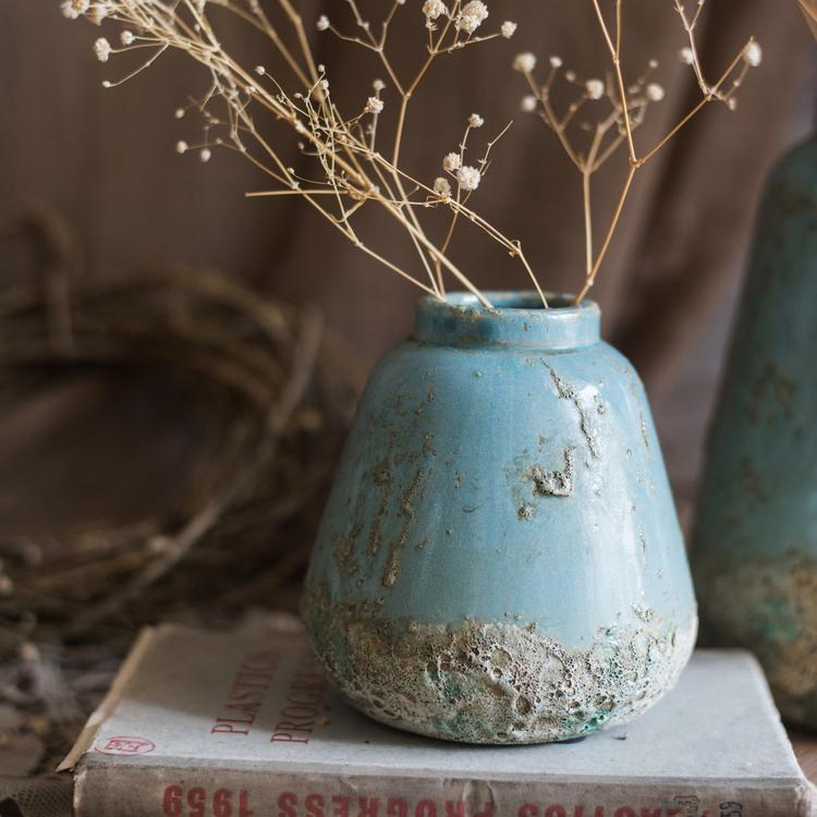 Turquoise ceramic vase by RusticReach with weathered glaze and dried twigs on Tampa Home & Garden Store