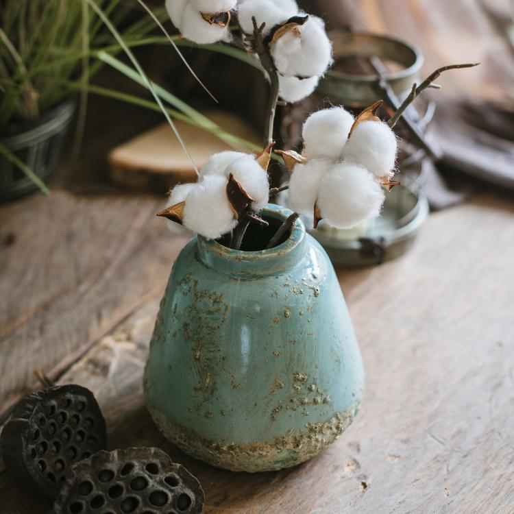 Turquoise ceramic vase by RusticReach with distressed glaze and cotton stems on Tampa Home & Garden Store