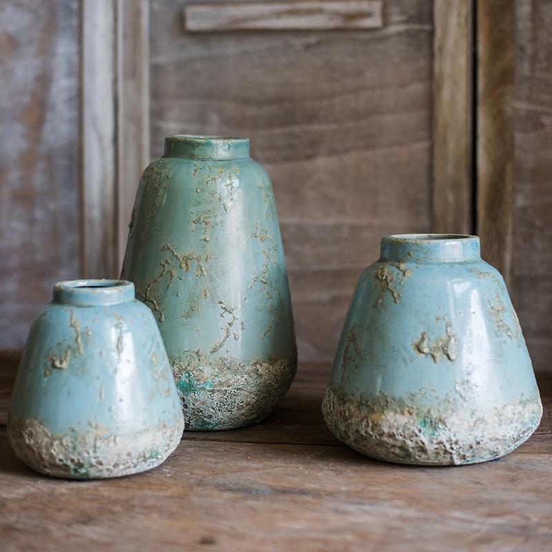 Three turquoise ceramic vases with rustic textured bases on Tampa Home & Garden Store