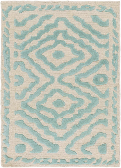 Tuskahoma Premium Area Rug by Boutique Rugs: turquoise abstract pattern on cream background on Tampa Home & Garden Store