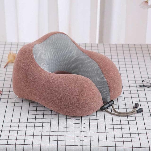 U-shaped memory foam neck pillow in brown exterior with gray interior, ideal for airplane travel on Tampa Home & Garden Store