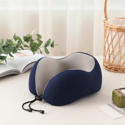 U-shaped neck pillow in navy with memory foam interior and adjustable drawcord for travel on Tampa Home & Garden Store