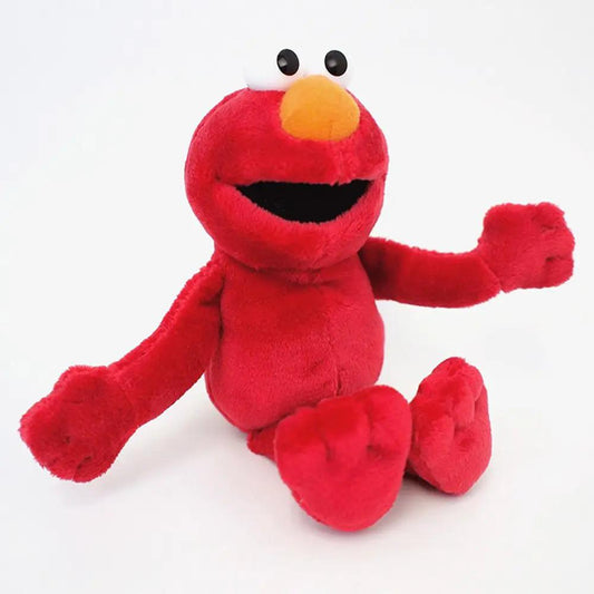 Elmo plush beanbag toy, red fuzzy Sesame Street character with orange nose, black mouth on Tampa Home & Garden Store