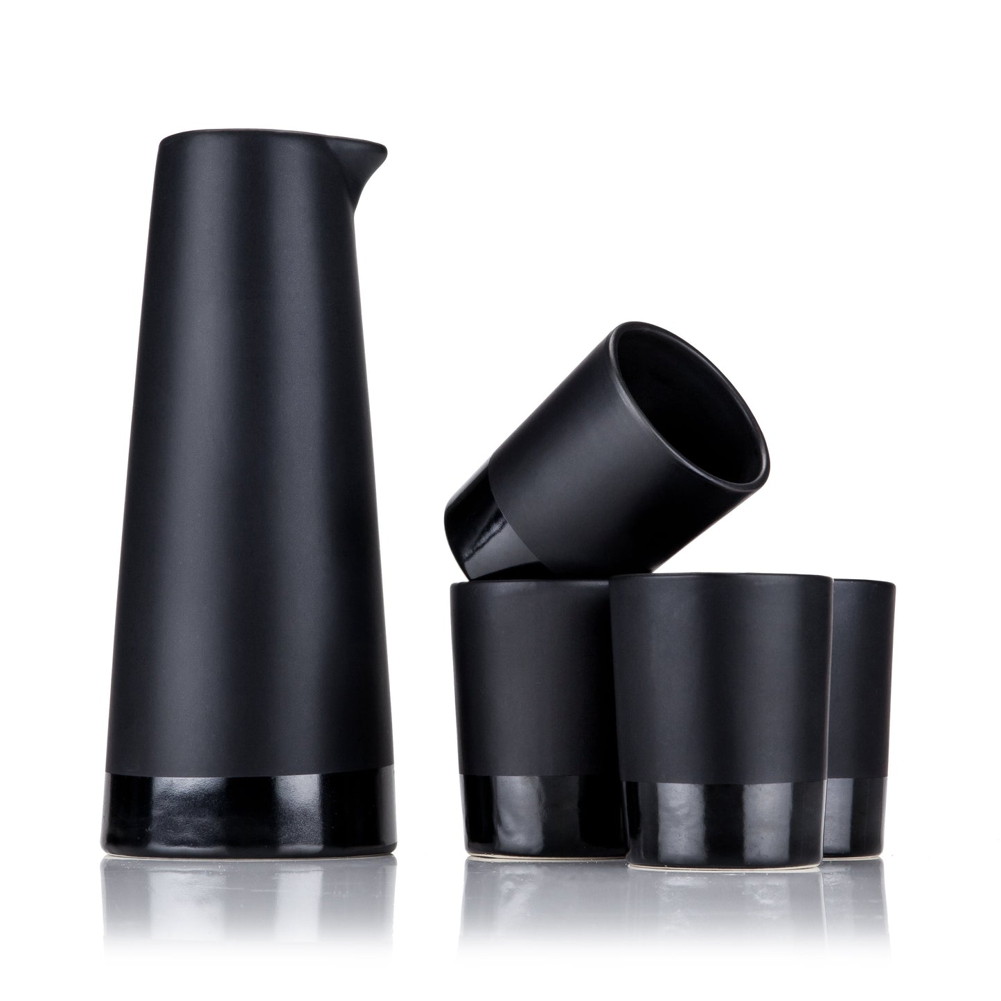 Four Black Stoneware Sake Tumblers and Carafe