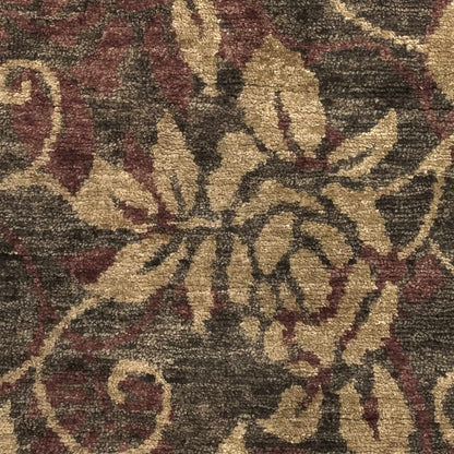 Uhland Jute Carpet rug with beige, brown and maroon antique scroll motif on Tampa Home & Garden Store