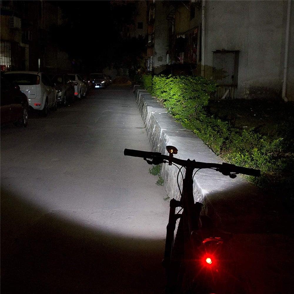 Stevvex USB Rechargeable Bike Light front torch on a black bike with bright white beam on Tampa Home & Garden Store