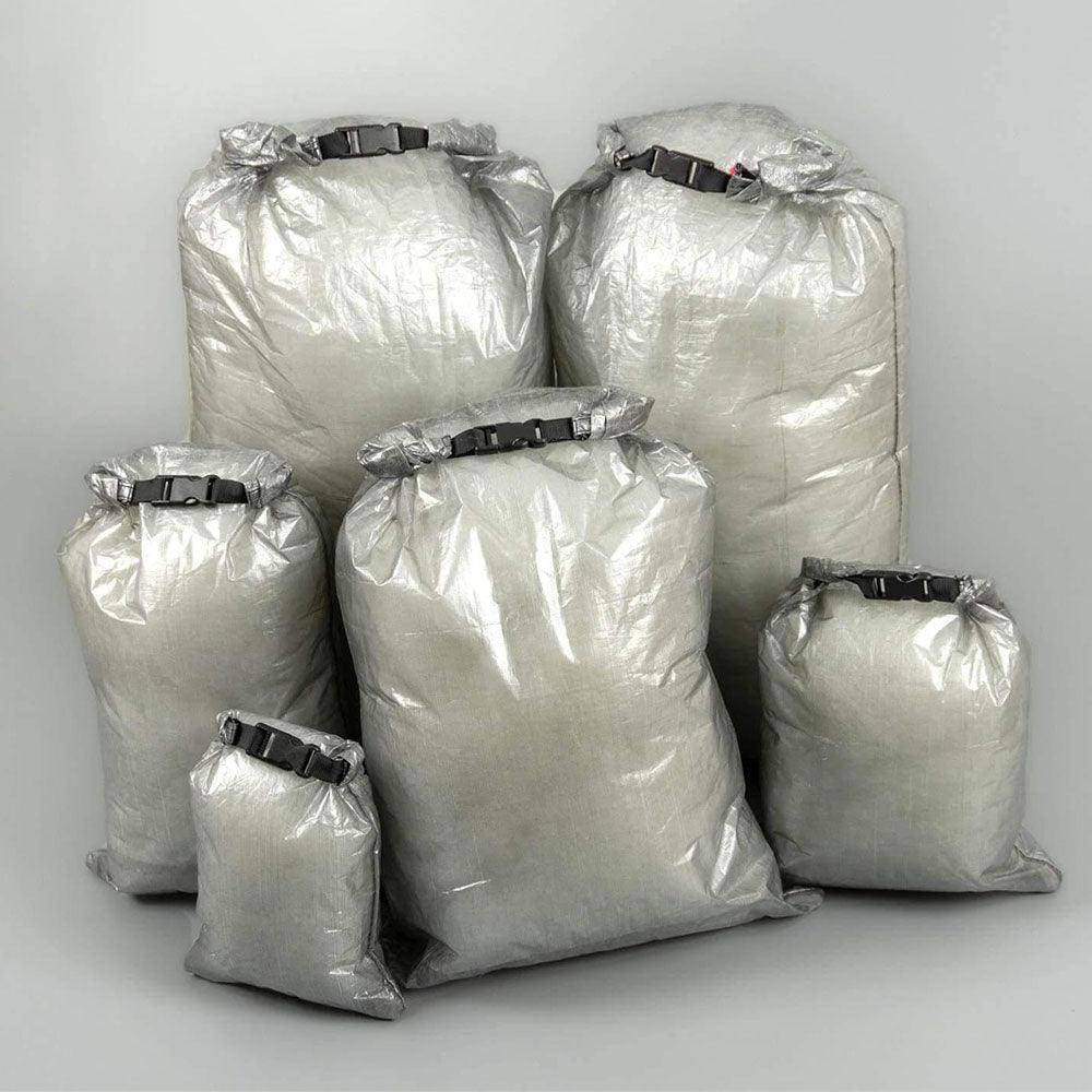 Ultralight Dyneema Dry Bag Roll Top in silver gray — six bags by Hilltop Packs LLC for camping on Tampa Home & Garden Store