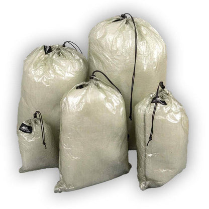 Ultralight Dyneema stuff sacks set of five in beige with black drawcords by Hilltop Packs LLC on Tampa Home & Garden Store