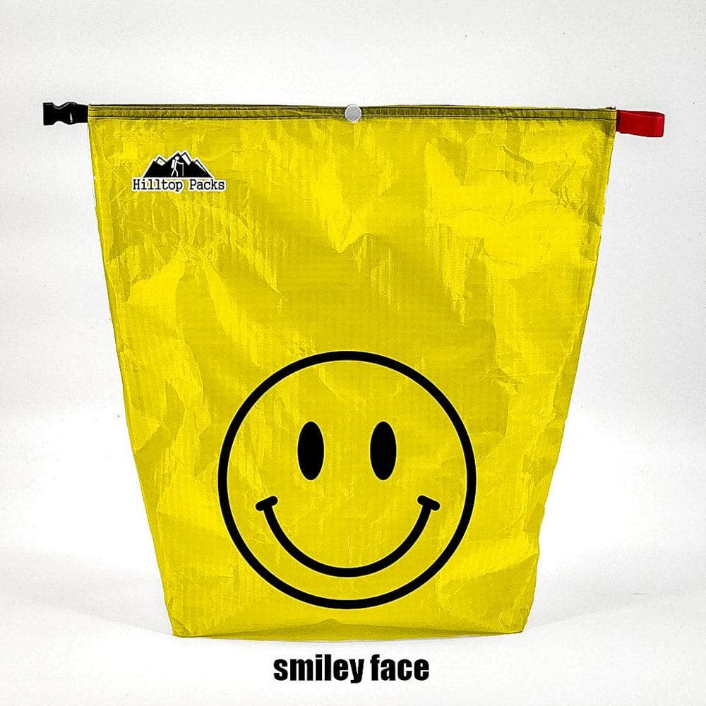 Ultralight food bag yellow with large black smiley face, Hilltop Packs LLC logo, Fun Prints Vol1 on Tampa Home & Garden Store