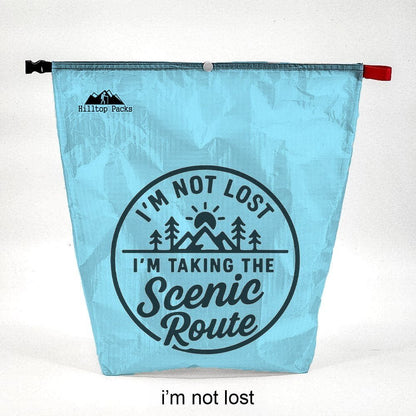 Ultralight blue food bag with Scenic Route print and Hilltop Packs LLC logo; red zipper pull on Tampa Home & Garden Store