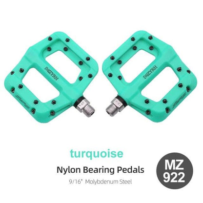Bicycle flat pedals turquoise nylon bearing pair by Stevvex with 9/16 inch molybdenum steel axles on Tampa Home & Garden Store