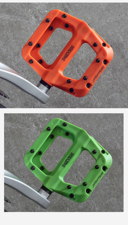 Stevvex Ultralight sealed bearing flat bicycle pedals in orange and green, non-slip alloy platform on Tampa Home & Garden Store