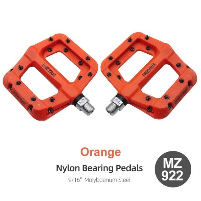 Stevvex orange nylon-bearing flat bicycle pedals with 9/16 inch steel axles, non-slip pair on Tampa Home & Garden Store