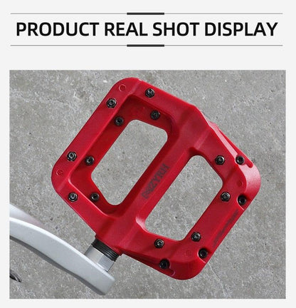 Stevvex red flat bicycle pedal with alloy body and non-slip grip on Tampa Home & Garden Store